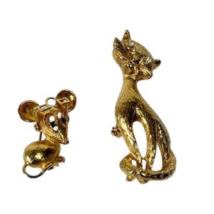 Gold-tone cat and mouse brooches/pins.
